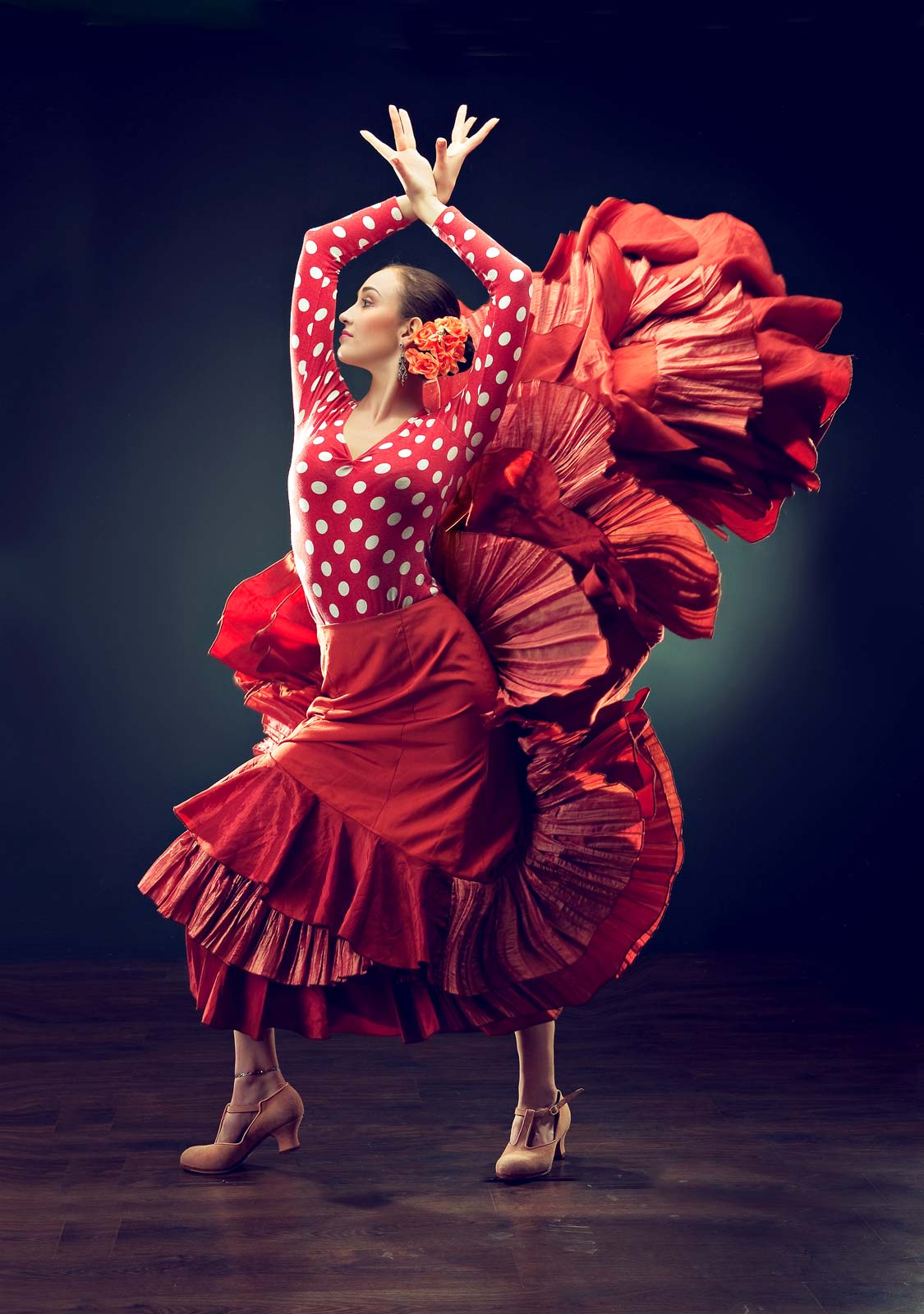 woman in red flowy dress dancing