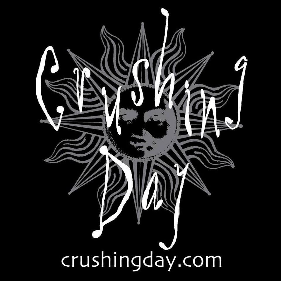 crushing day band logo with abstract white sun background